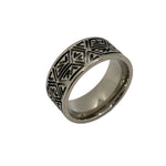Aztec inlay pattern channel titanium ring core